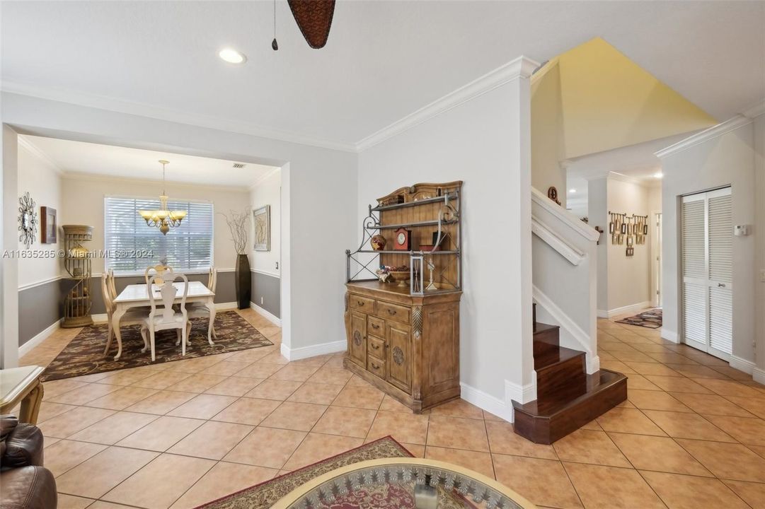 Living/dinning room plus staircase to the bedrooms