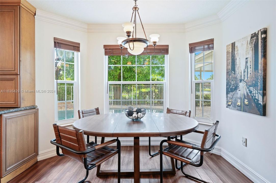 Breakfast area overlooks the salt water pool and patio!