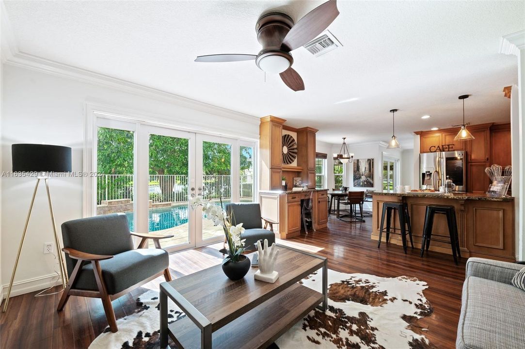 Family Room, Breakfast Area and Kitchen all overlook the sparkling pool & patio.