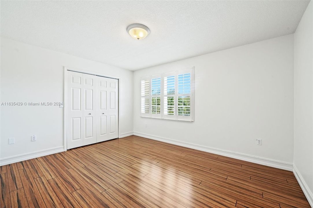 Bedroom # 4, also features Teak wood Flooring.