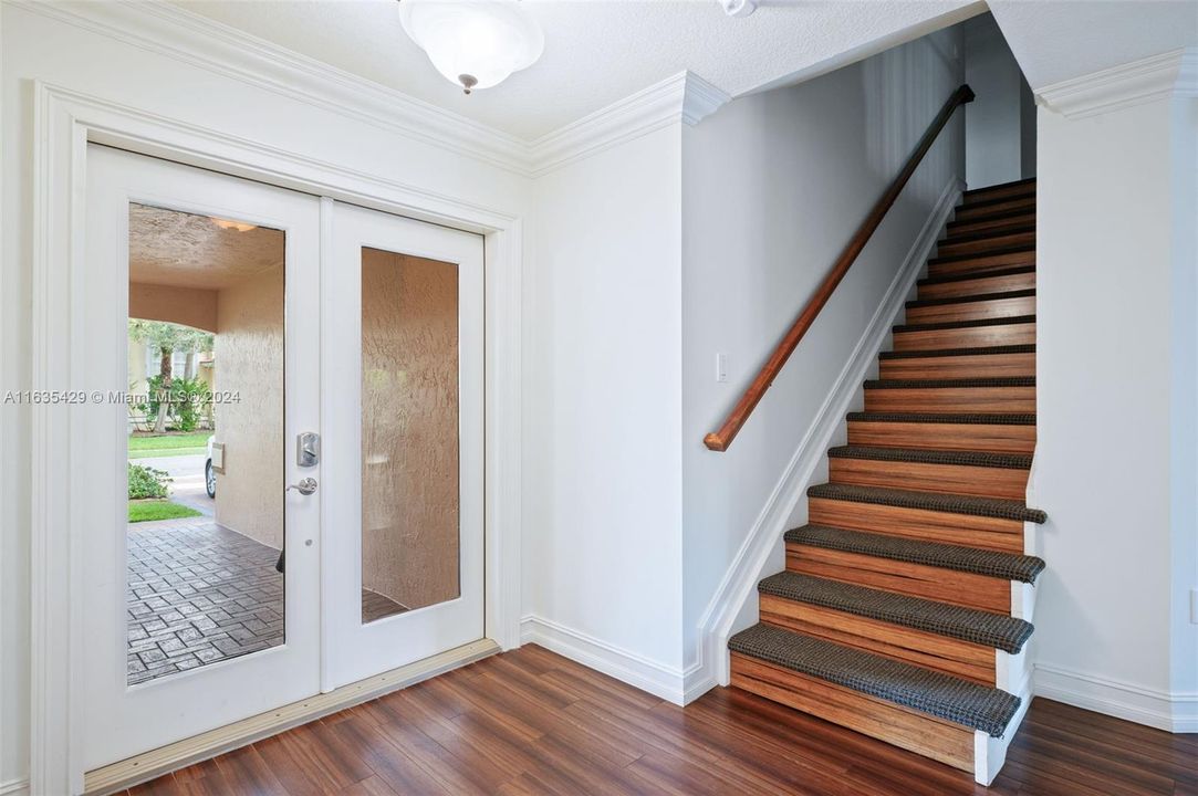 Clear Impact Glass & double door foyer entry.