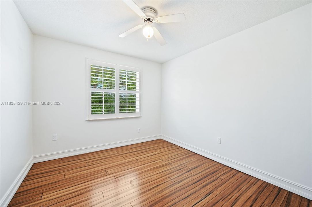 3rd bedroom w/ teak Flooring