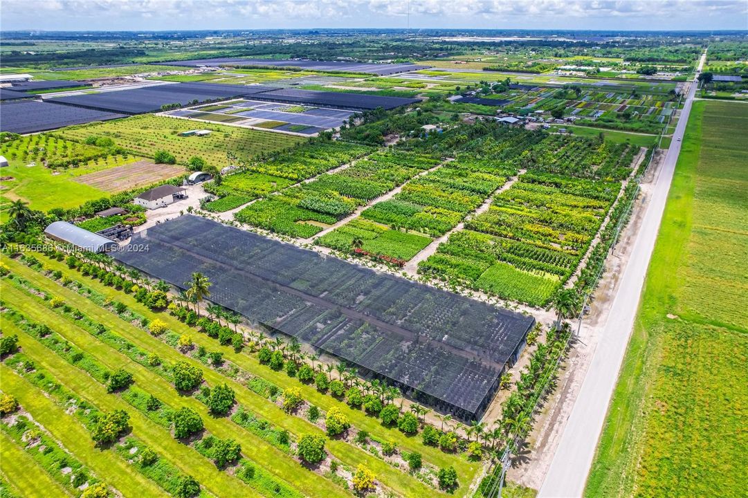 15 ACRES GORGEOUS LAND  PLUS ...... MIST,SHADE, SUN ,INGROUND PRODUCT W MULTIPLE BLDGS, DOCKS, LIVING AREAS... TURN KEY IDEAL AS IS OR TO REHAB INTO A  VENUE FOR ENETRTAINMENT/ EVENTS OR BUILD OUT..BEAUTIFUL PAVED ROAD WITH VIEWS OF TH EVERGLADES ACCROSS THE CANAL INSEEN TO THE RIGHT (west)