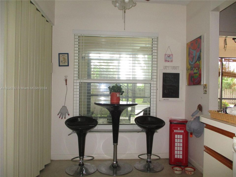 A bistro seating area with natural sunlight