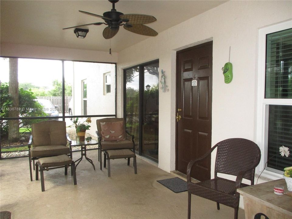 Entrance into large screened patio