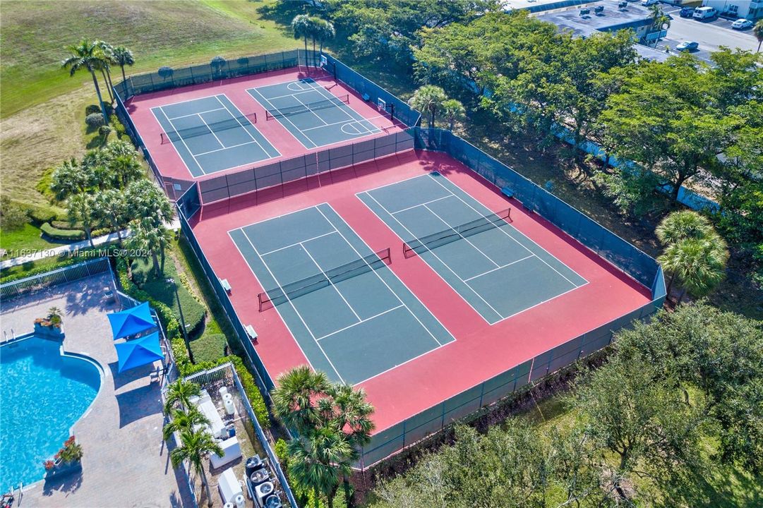 Tennis courts surrounded by nature