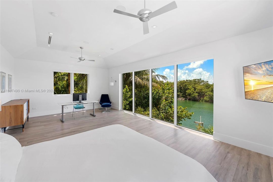 MASTER BEDROOM WITH FLOOR TO CEILING VIEWS