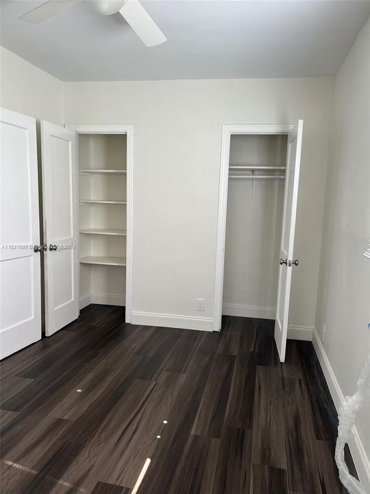 Bedroom with plenty of storage.