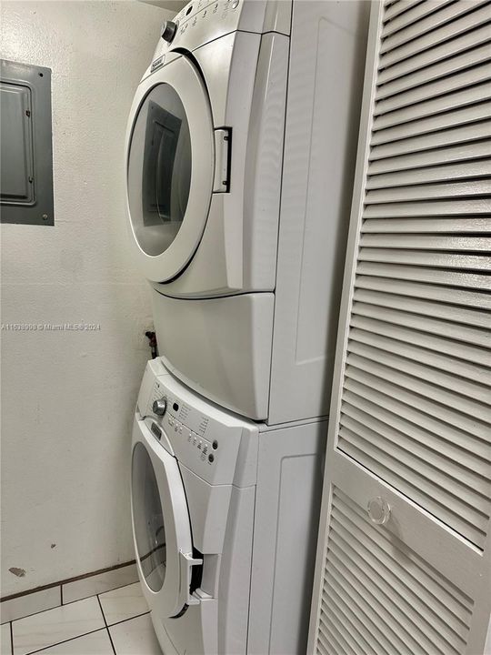 large washer and dryer inside unit