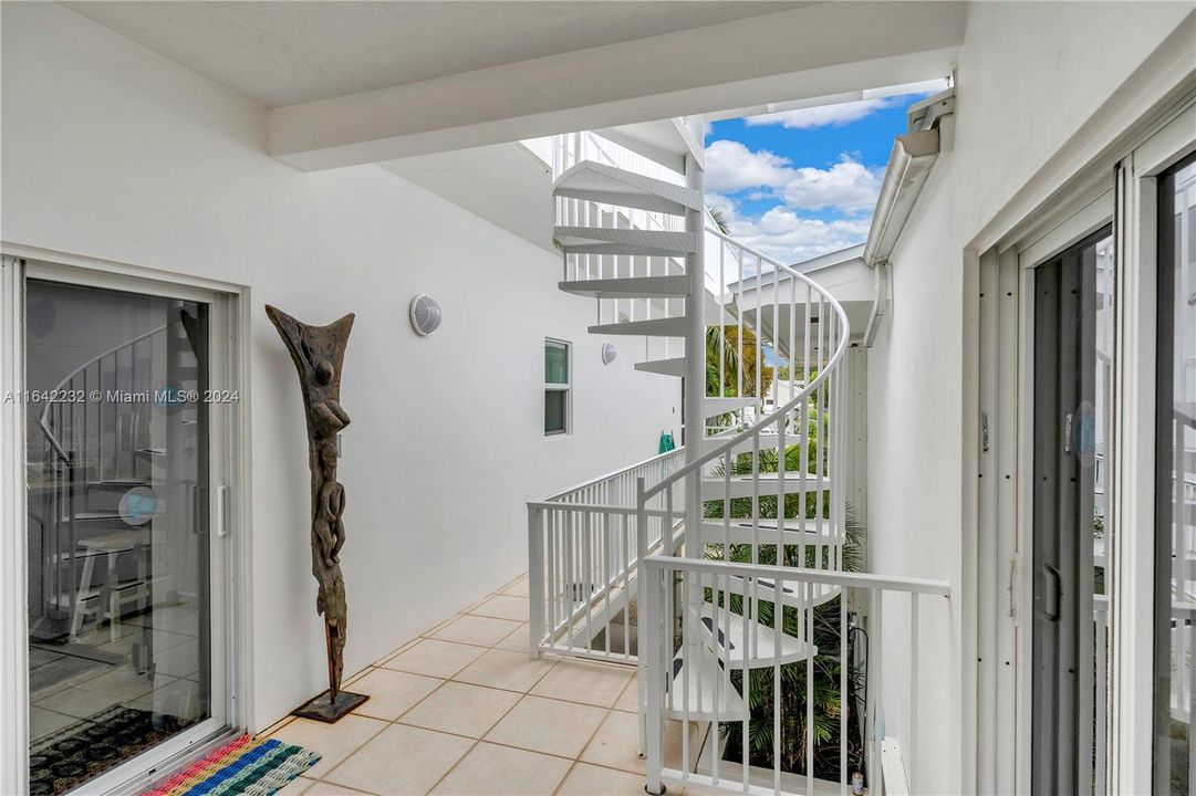 Covered breezeway to The guest house from the primary house