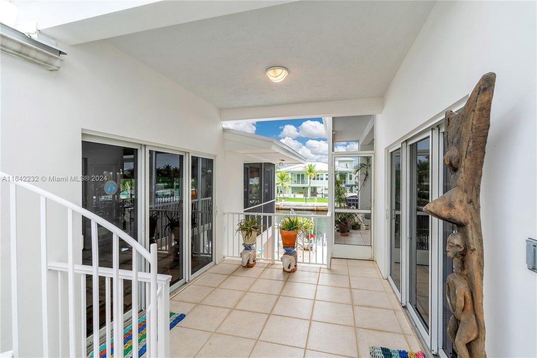 Covered breezeway to The guest house from the primary house