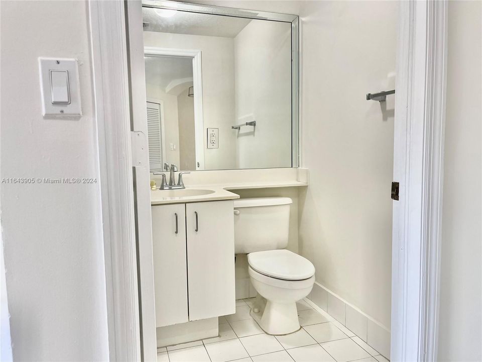 Guest Full Bathroom, 1st floor. Between dining and living infront of stairs to secondfloor.