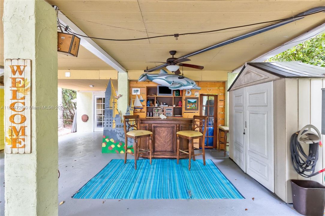 Downstairs EntertainingCovered area provides a great spot for year 'round entertaining..