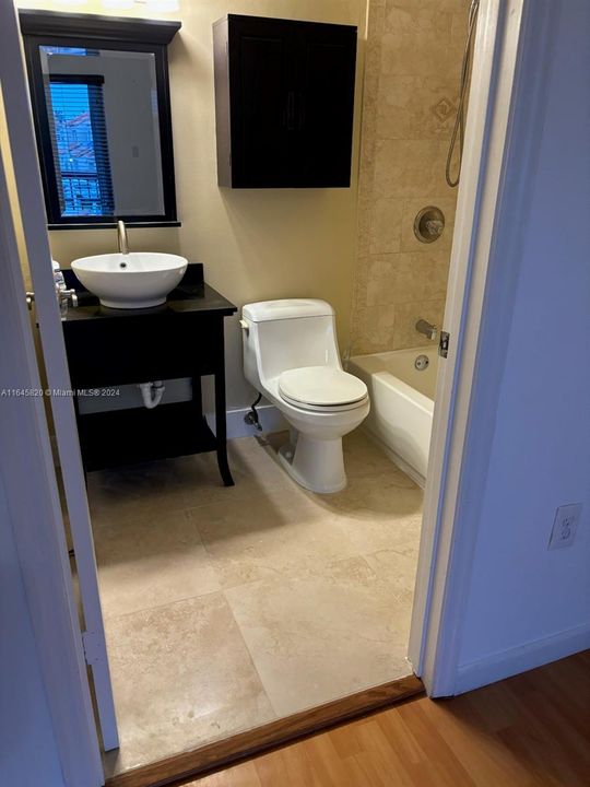 2nd Master Bathroom - The bathroom floor has been newly tiled.