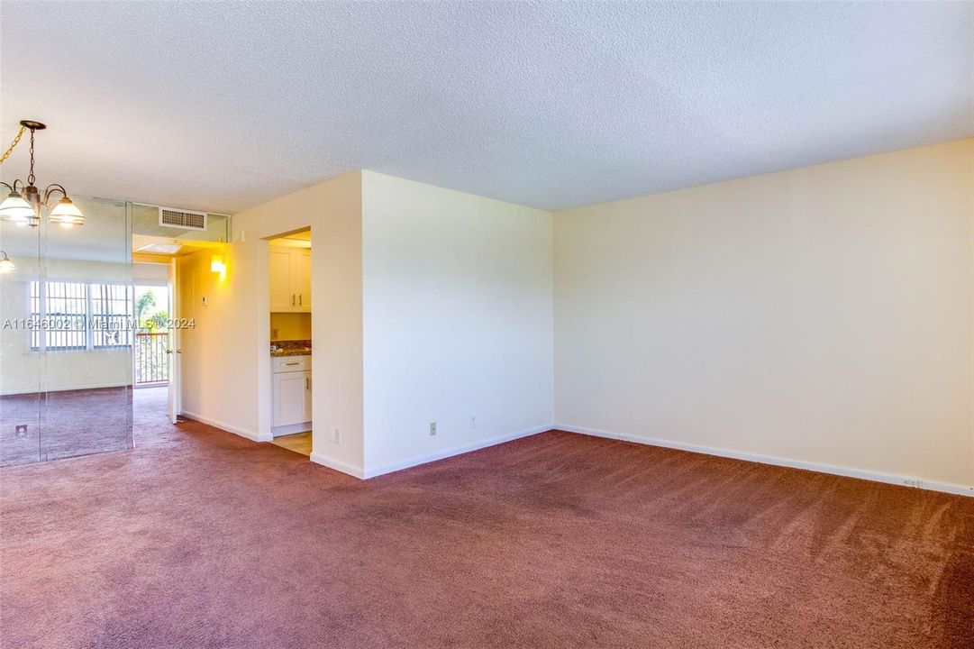 view of living and dining room from front door