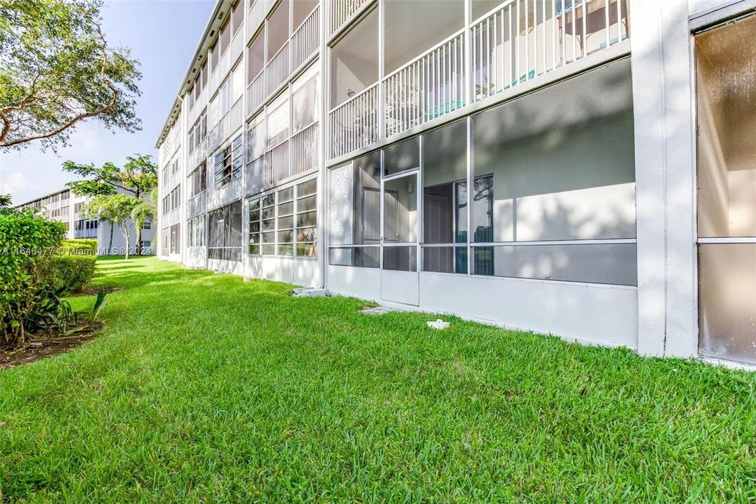 screened in balcony leads to golf course