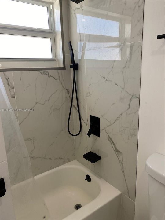 second bathroom with tub