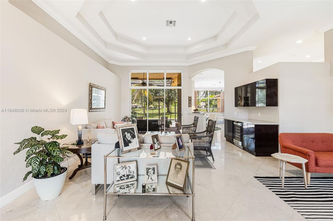 Beautiful marble floors in main living areas/new custom designed modern bar.