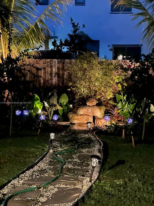 from family room is this amazing waterfall garden well lit