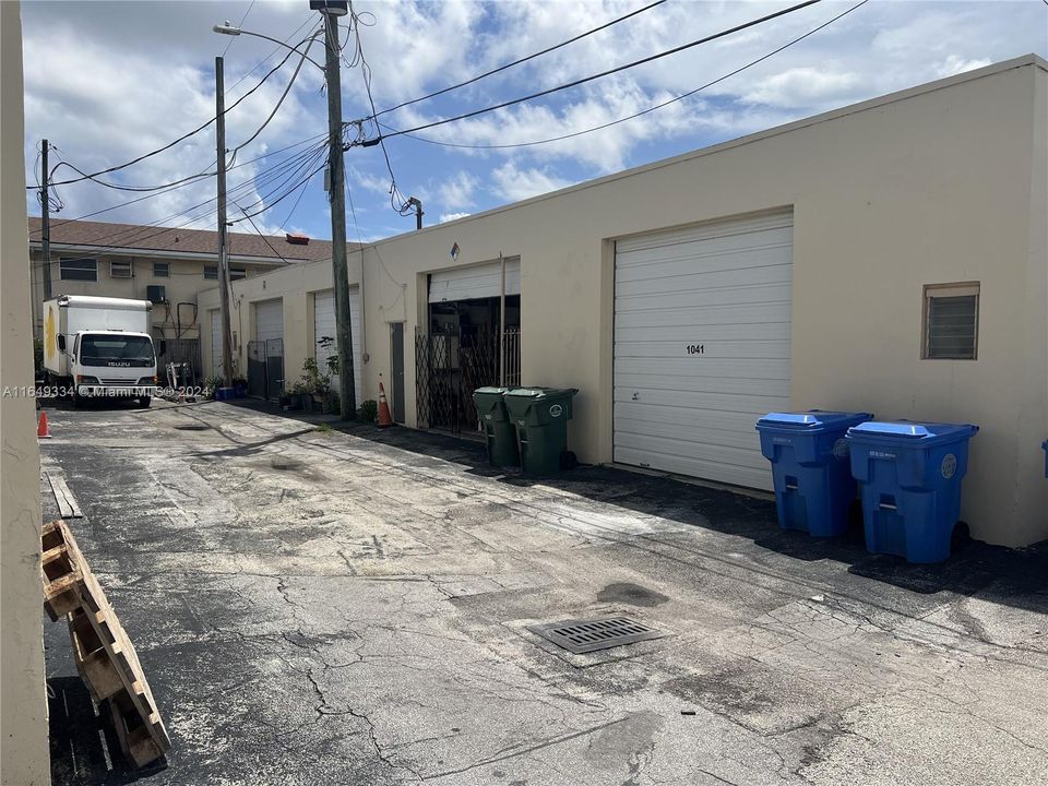 Alley with view of warehouse