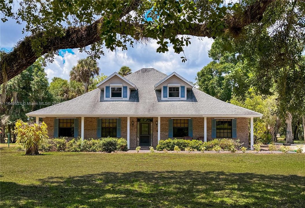 865 E Fort Thompson Avenue, LaBelle, FL 33935 - 4BR/4BA Family Home with Pool + 1 Acre