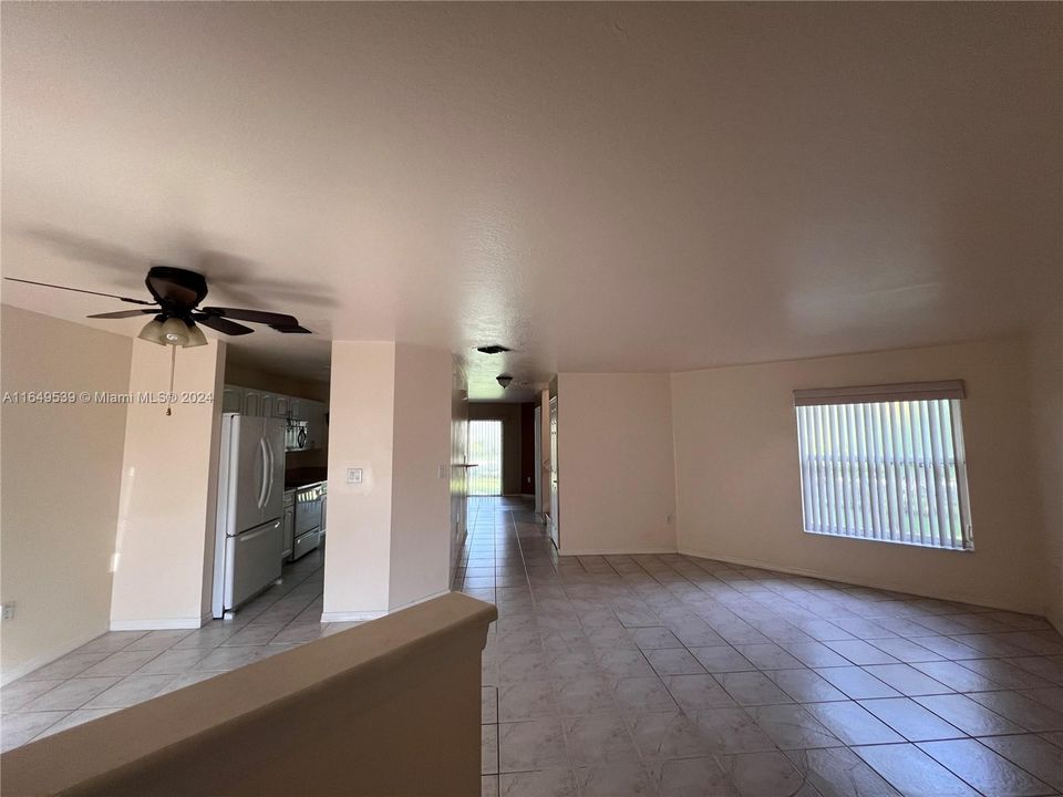 Entrance, living and dining area (to the left)