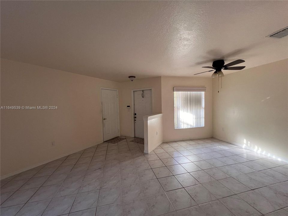 Front door from inside and dining area