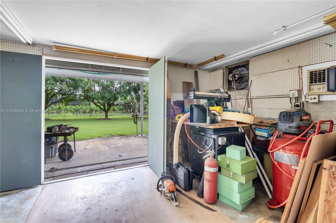 A.C SECTION HAS A LOFT ABOVE FOR STORAGE AND OPENS TO OUTSIDE CARPORT