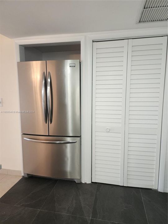 Refrigerator and utility closet (AC and Water Heater)