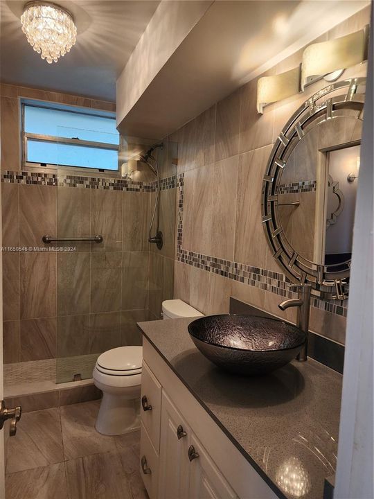 Elegant bathroom with large shower.