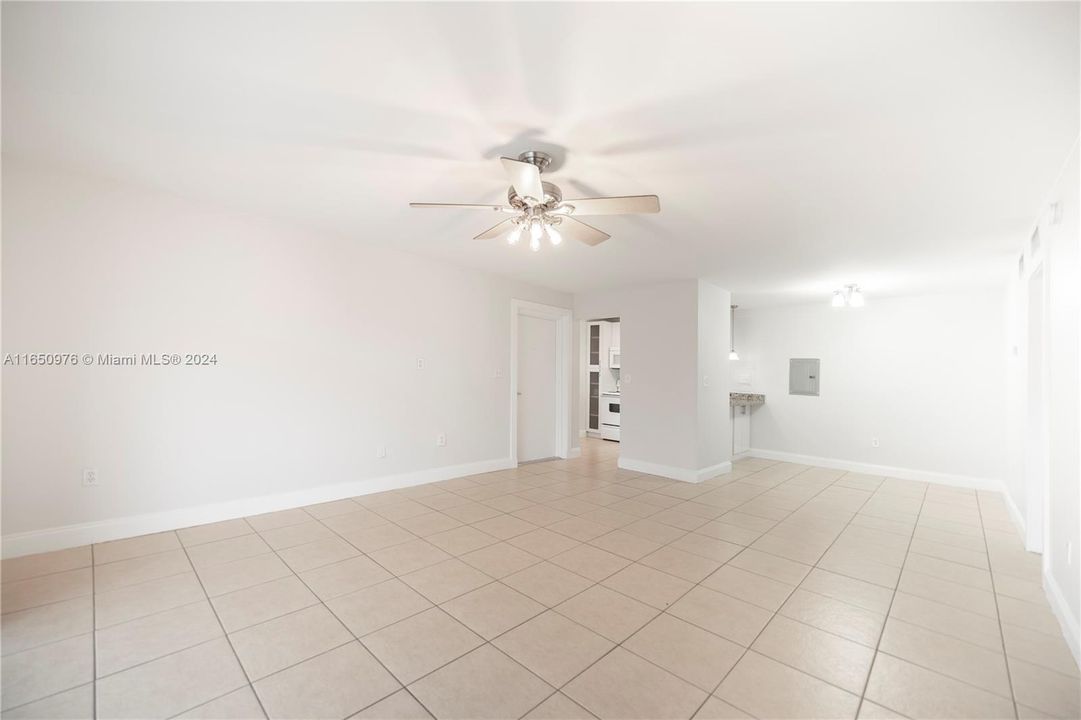 View from living room towards formal dining and kitchen