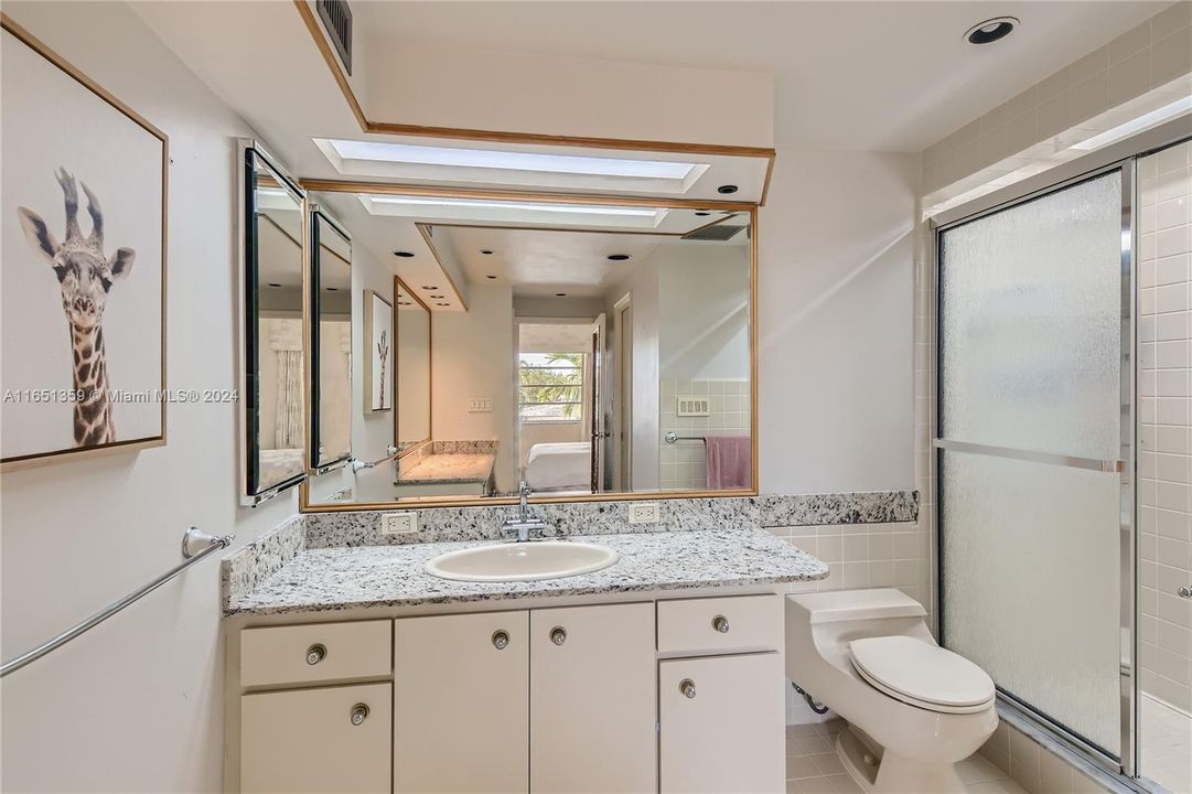 Master bathroom has shower.