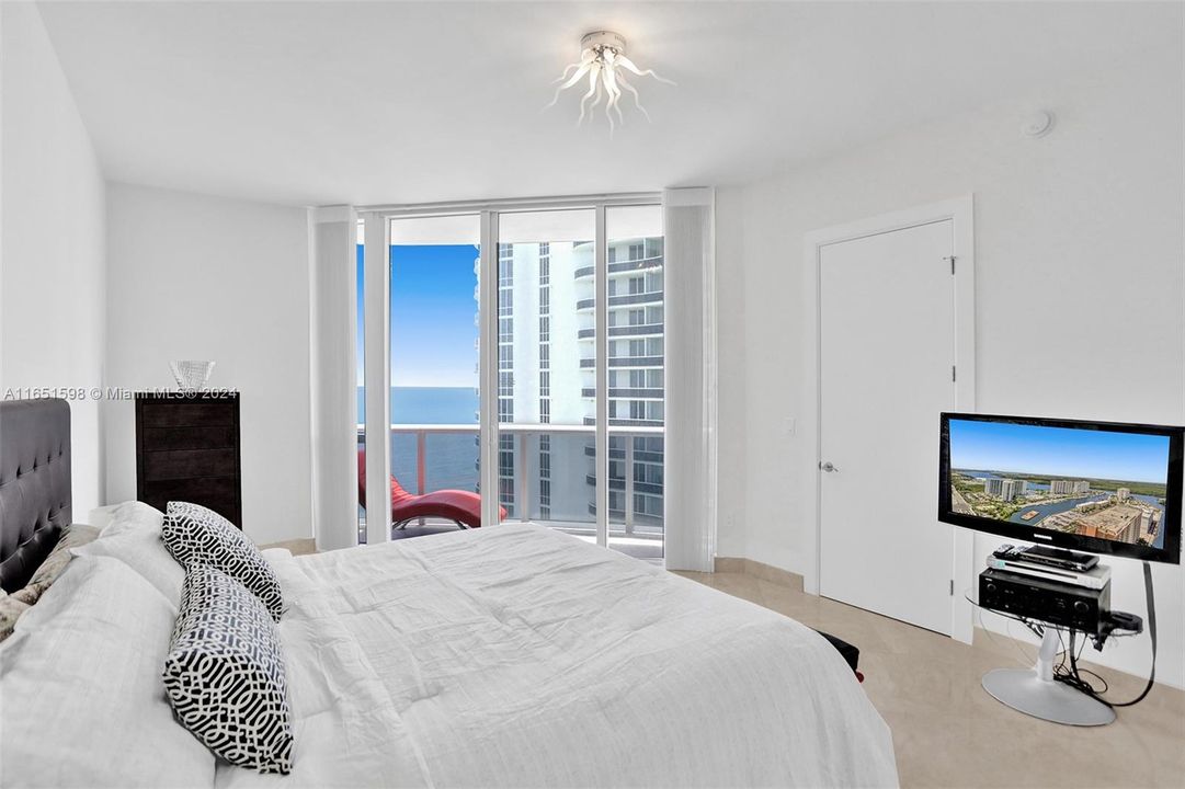 MASTER'S BEDROOM WITH ITS OWN BALCONY , OCEAN VIEW