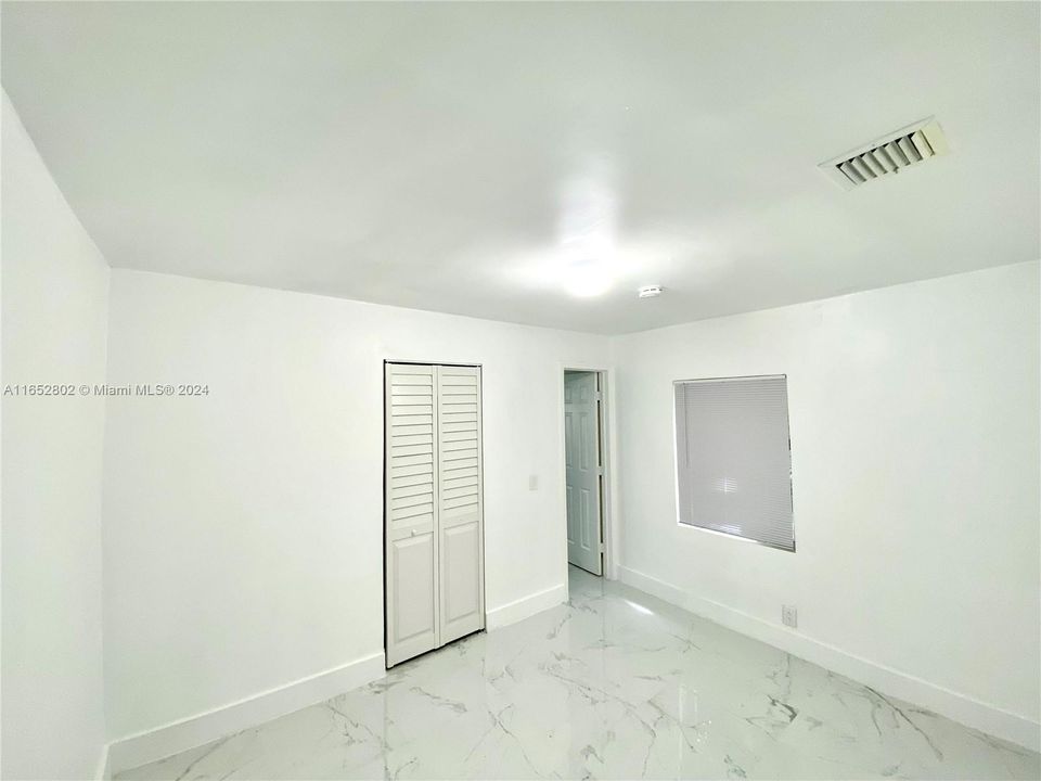 Large walk in closet with Master Bathroom