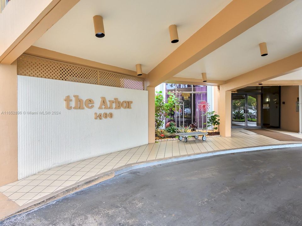 Entrance to front of 1400 Arbor Building has portico cover