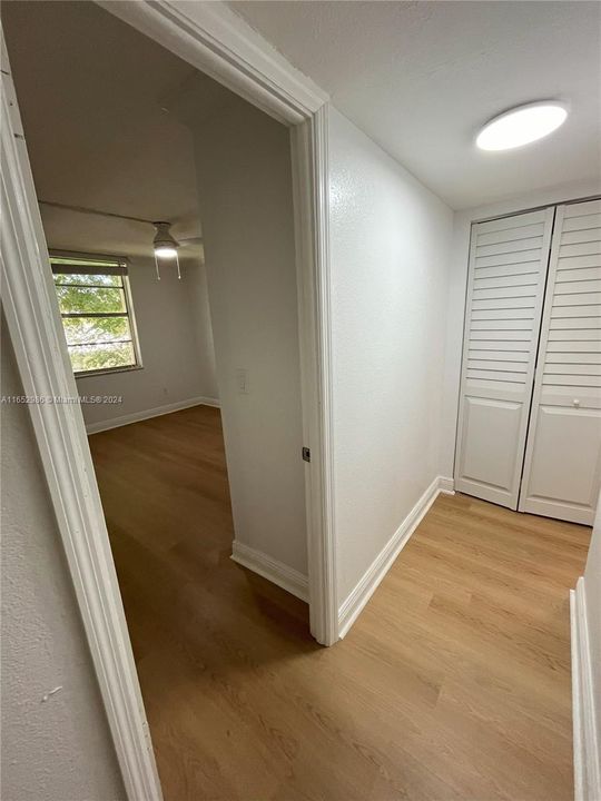 Hallway to 2nd bedroom, laundry & bathroom