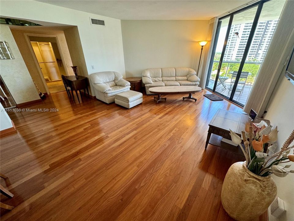 EXQUISITE NEW SOLID AMENDIUM BRAZILIAN HARDWOOD FLOORING THROUGHOUT LIVING AREAS.ENTIRE UNIT HAS JUST HAD ALL POPCORN REMOVED FROM CEILINGS AND COMPLETLY REPLASTERED AND PAINTED THROUGHOUT "TURNKEY" ELEGANT UNIT WITH THE BEST EAST VIEWS