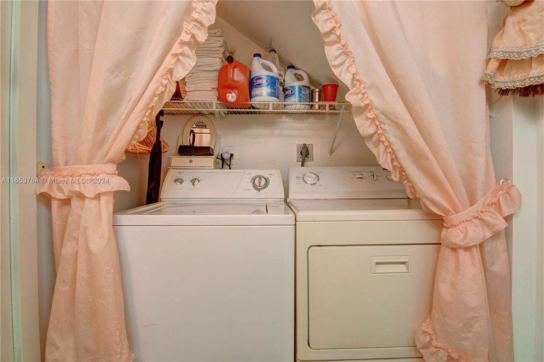 Washer and dryer inside the unit.