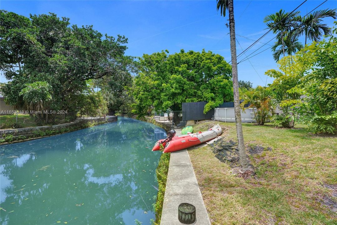 Canal front has concrete seawall