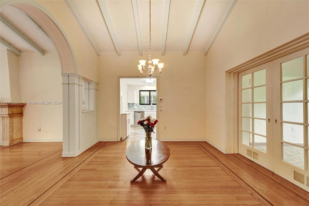 DINNING area extends to the Florida room with French doors