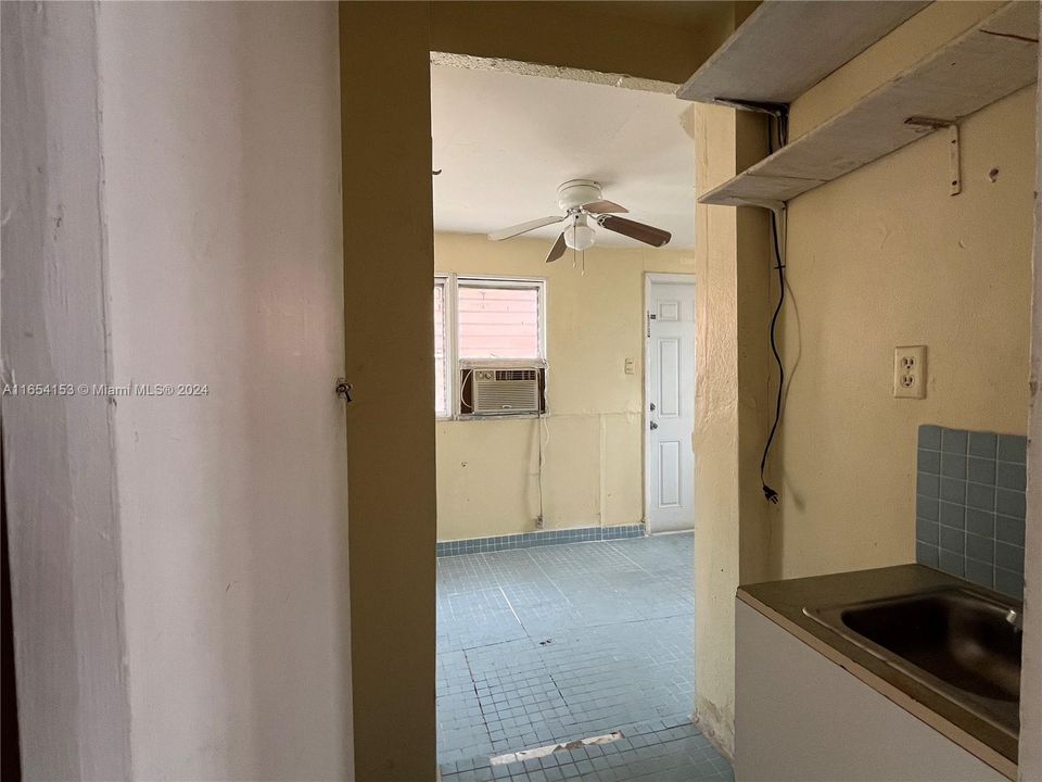 Passage from kitchen to other room in Front Unit