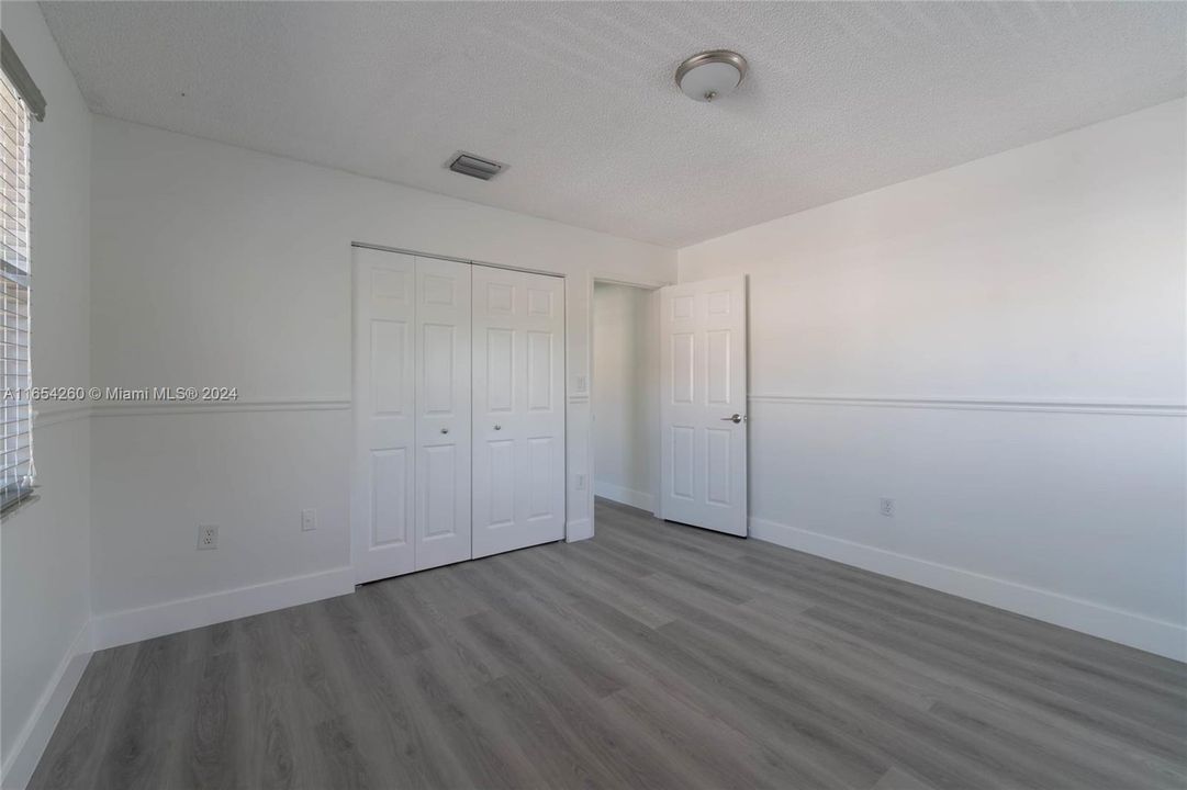 Upstairs bedroom #1 with built in closet