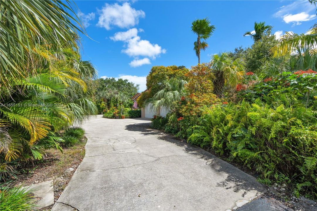 Private road leads to this home, last on the street and ultra-private.