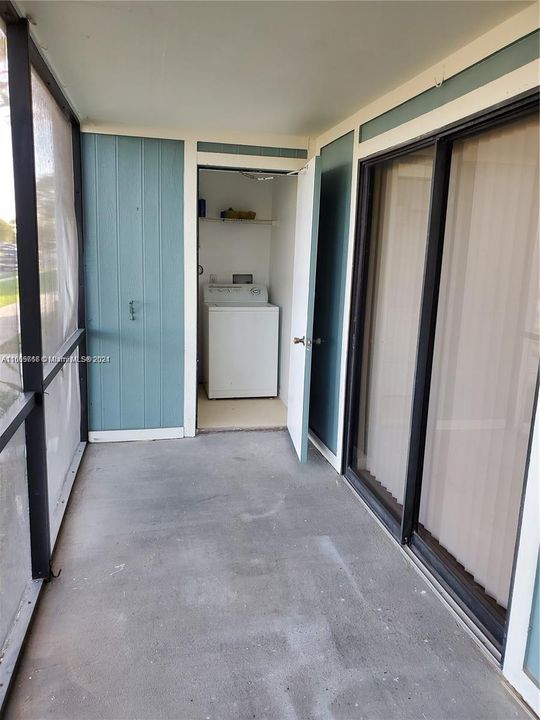 Partial View of Screened Patio and Laundry/Storage Room