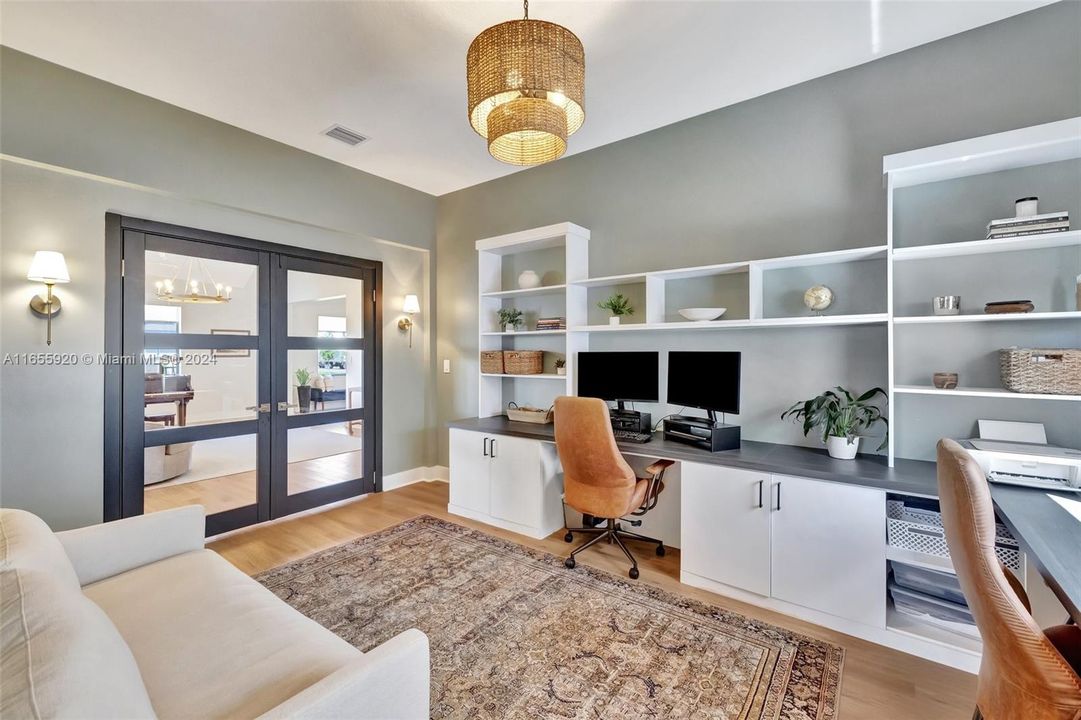 Office w/' built in desks, cabinets and doors. Dining Area was converted.