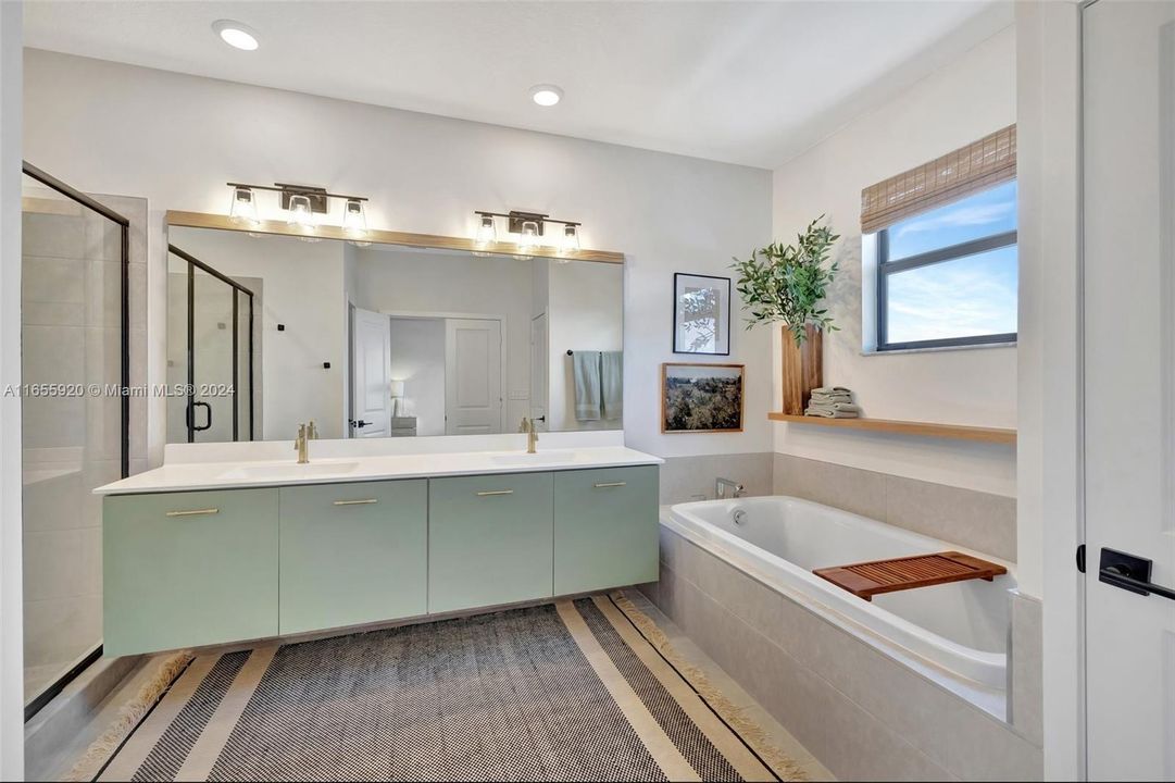 Spa Bathroom w/ Separate Tub & Shower overlooking lake