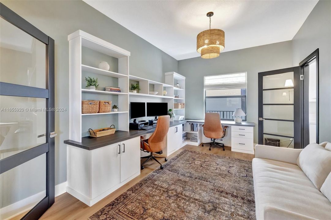 Office w/' built in desks, cabinets and doors. Dining Area was converted.