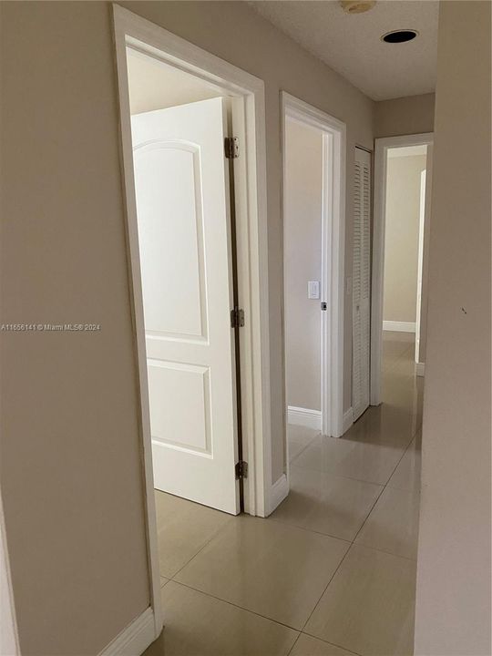 Hallway to 2nd & 3rd Bedrooms and Bathroom