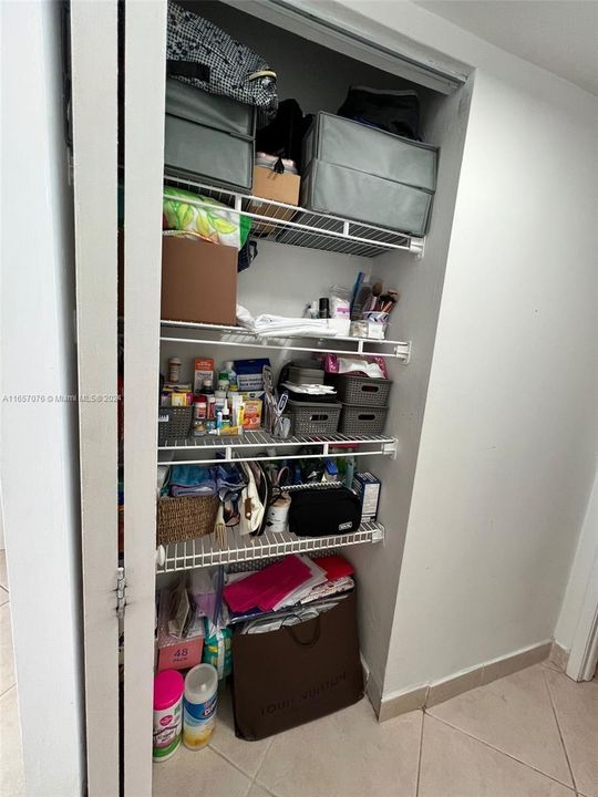 Linen/storage closet in bedroom.