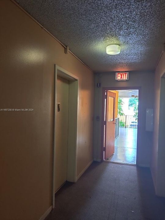 Unit at end of hall nearest to laundry and elevator